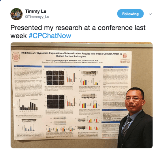 Timmy tweeted about presenting his latest research at a conference. There is an image of Timmy presenting at a conference.