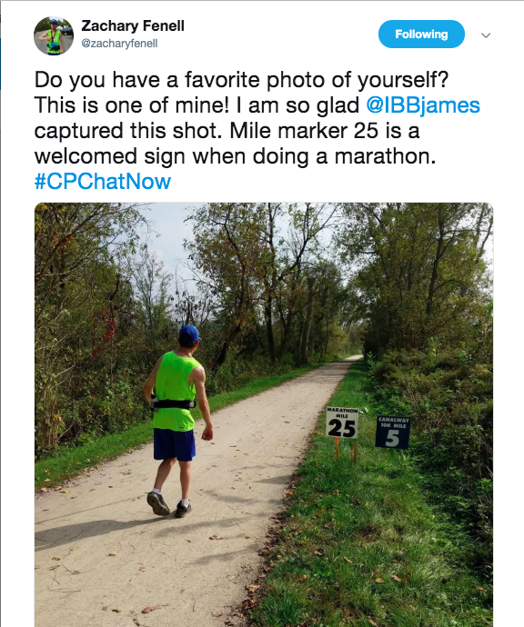 zach sharing his favorite photo of him passing mile marker 25 during his marathon