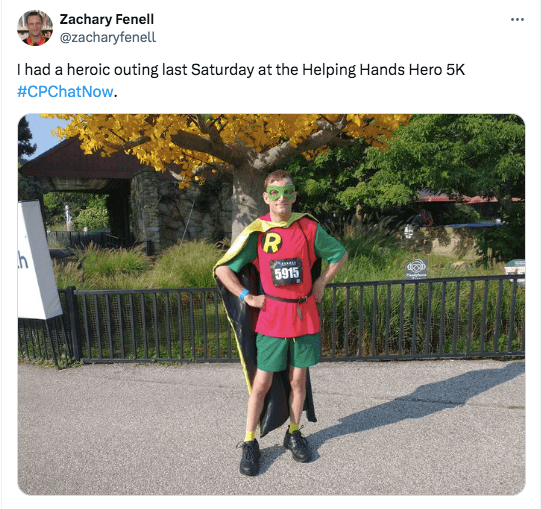 a picture of zach at a 5k in a Robin costume 